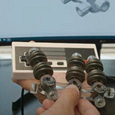 3D-Printed Soft Robotic Hand NES Video Games