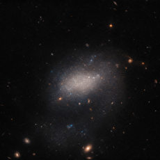 Hubble Space Telescope Galaxy UGC 7983 Asteroid