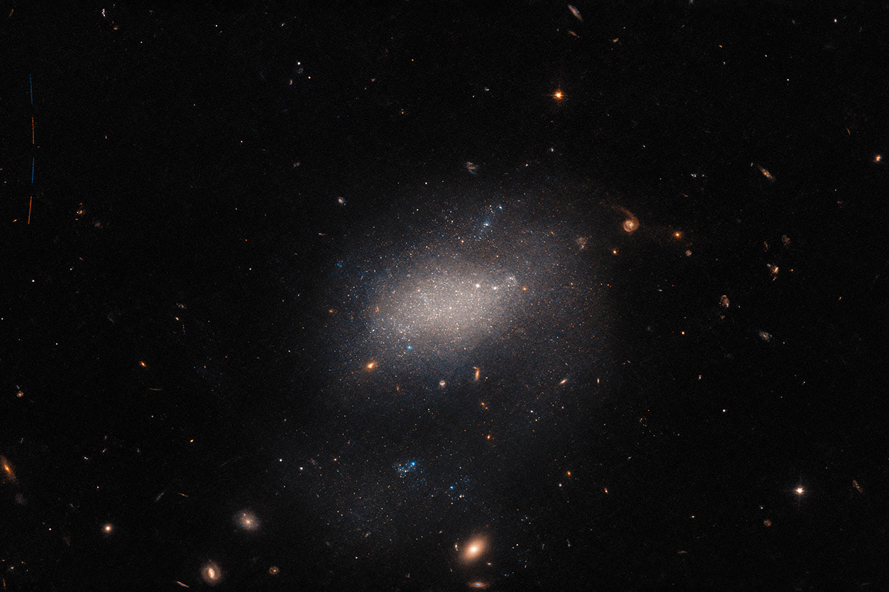 Hubble Space Telescope Galaxy UGC 7983 Asteroid